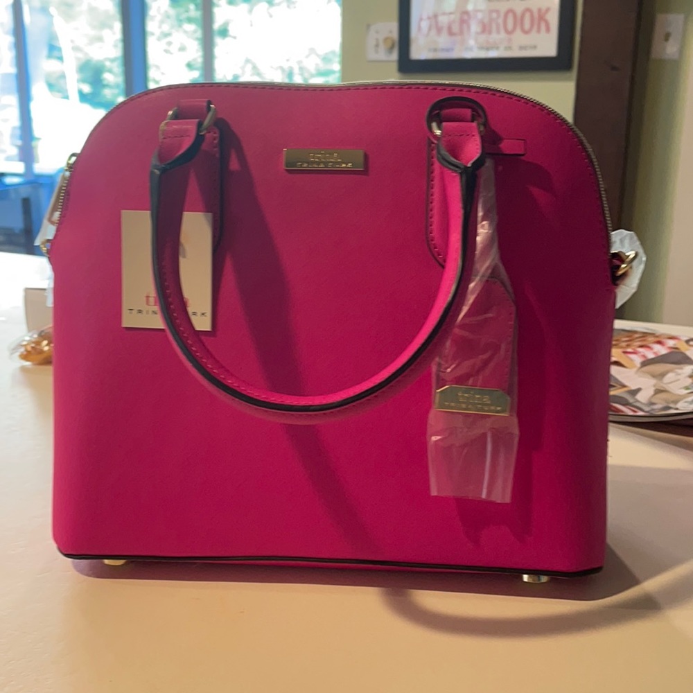 hot pink trina turk bag.